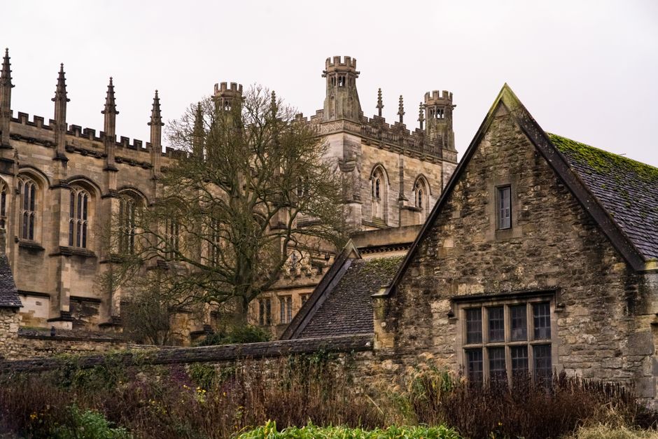 A picturesque view of ancient Gothic-style buildings in Oxford, UK, showcasing architectural beauty.